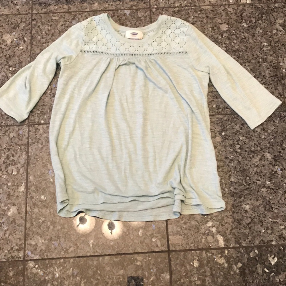 light blue half sleeve shirt. size 8